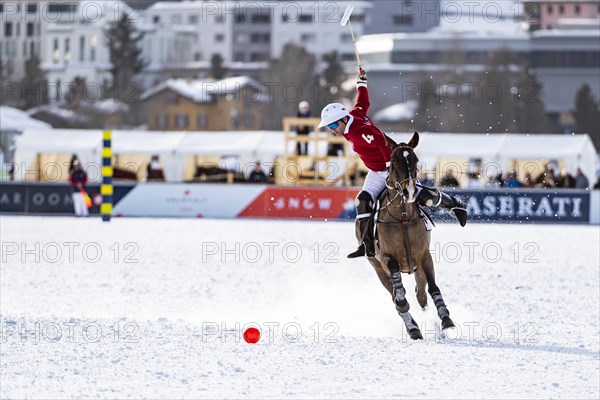 Nacho Gonzalez of Team St. Moritz takes a swing