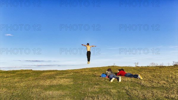 Young people on the edge of a cliff