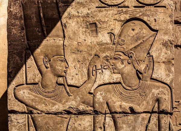 God Amun with the Pharaoh in a chapel