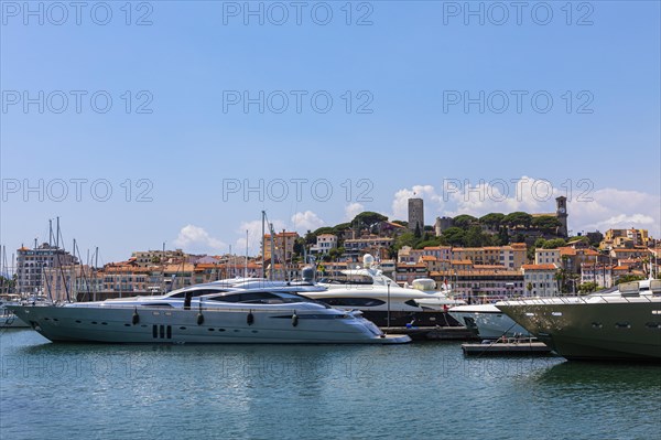 Luxury yachts anchor in the harbour of Cannes