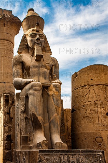 South doorway to the Great Colonnade with colossal statues of Ramses II. Luxor Temple