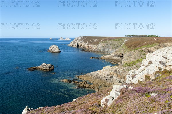 Rock islands in front of rocky coast