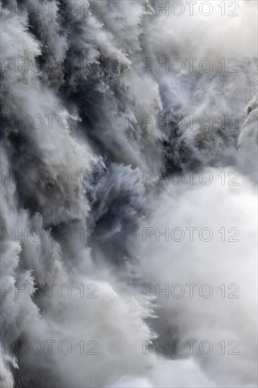 Woman standing in front of gorge