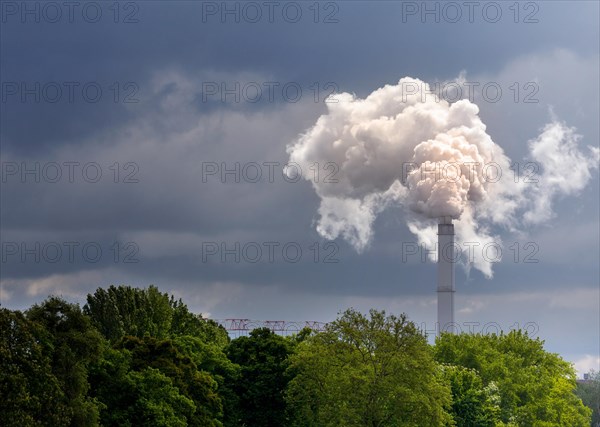 Smoking industrial chimney from Klingenberg power station in Rummelsburg