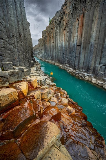 Tourist at Stuolagil Canyon