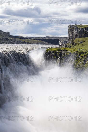 Woman standing in front of gorge