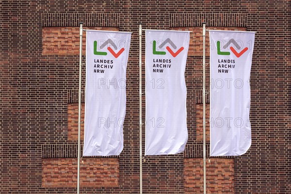 Brick facade with flags