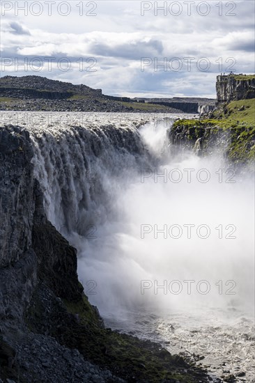 Woman standing in front of gorge