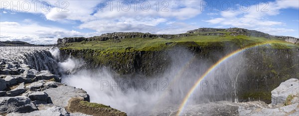 Woman standing in front of gorge