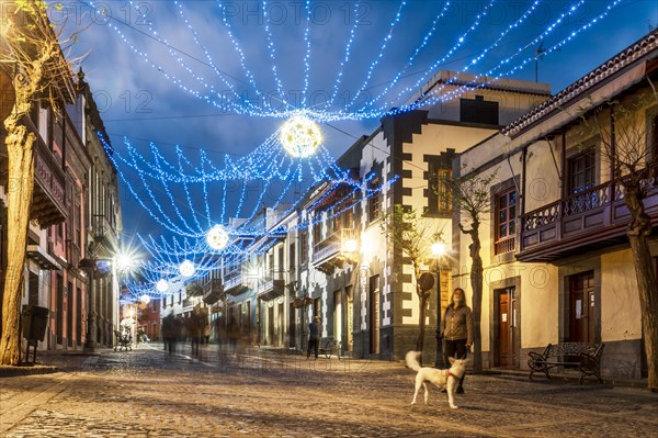 Illuminated main street in historic Teror