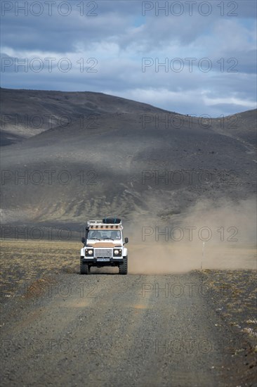 Land Rover Defender on gravel road