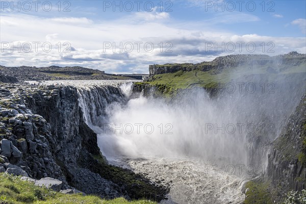 Woman standing in front of gorge