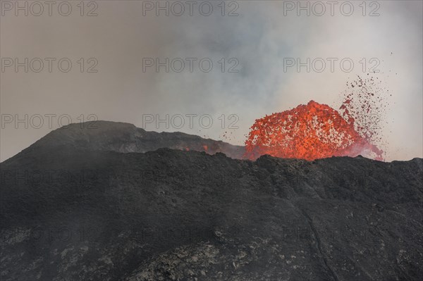 Lava fountain spouting from crater