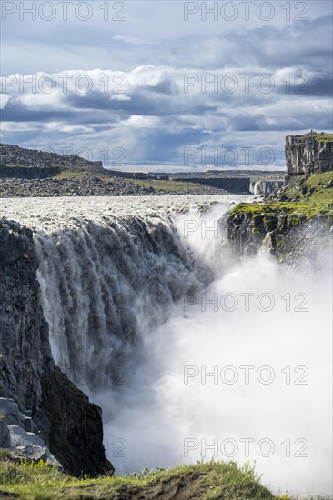 Woman standing in front of gorge