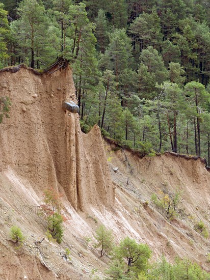 Steep scarp with earth pyramid