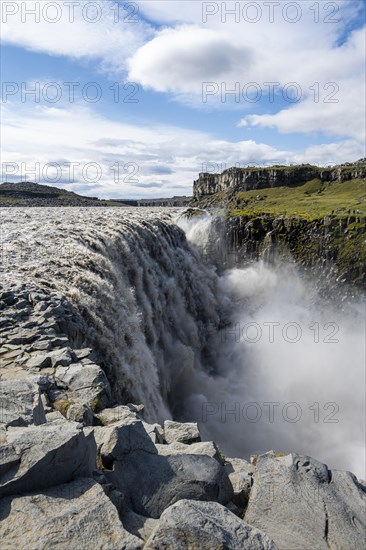 Woman standing in front of gorge