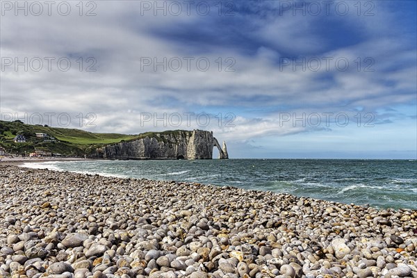 Stone beach with view of the chalk coast