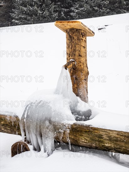 Water frozen to ice at a fountain