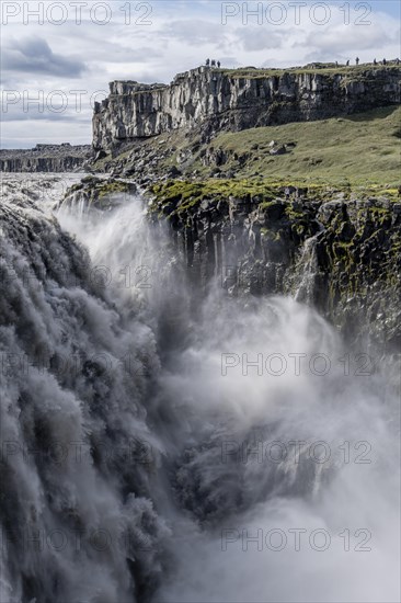 Woman standing in front of gorge