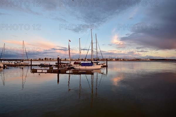 Sailboat anchored in the marina of Portimao