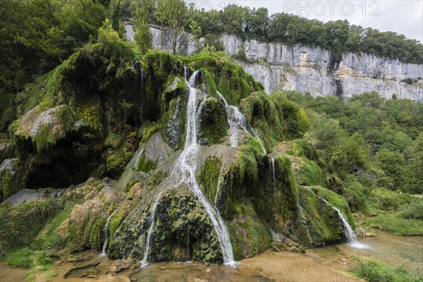 Waterfall and moss-covered rocks