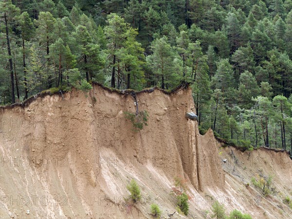 Steep scarp with earth pyramid