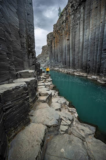 Tourist at Stuolagil Canyon