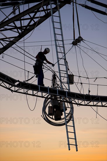 High-voltage fitter at work