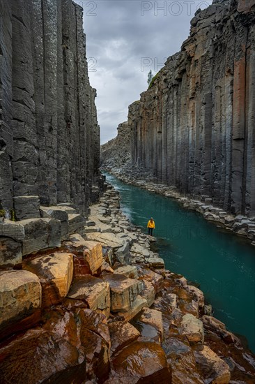 Tourist at Stuolagil Canyon