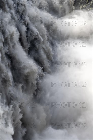 Woman standing in front of gorge