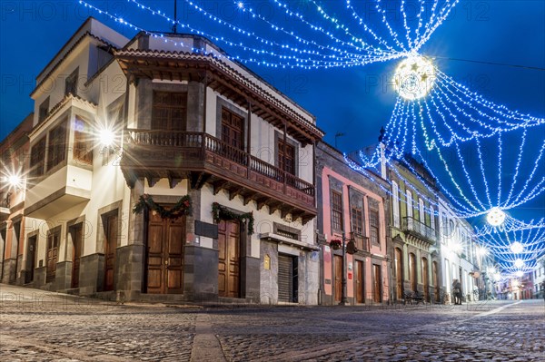 Illuminated main street in historic Teror