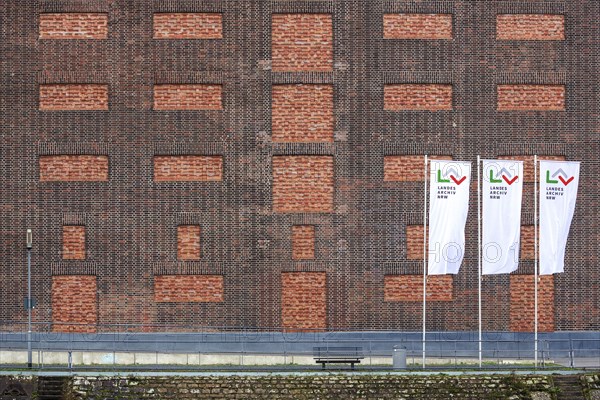 Brick facade with flags