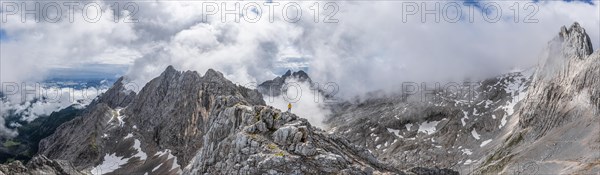 Hiker at the summit of the Westliche Toerlspitze