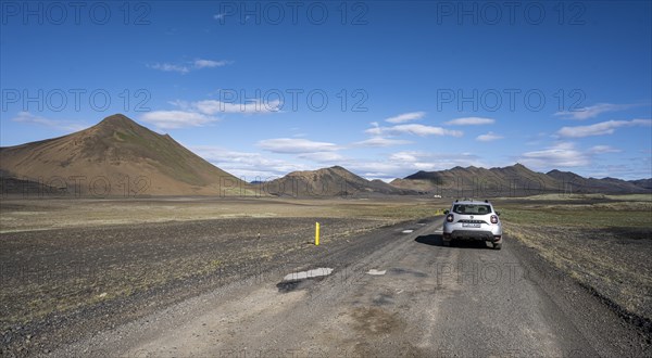 4x4 car on gravel road