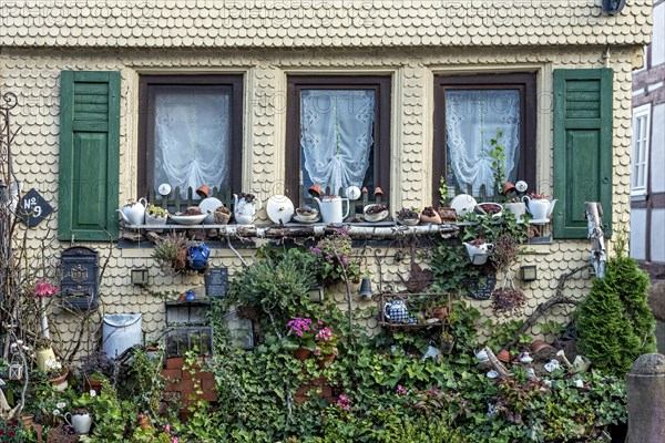 Historic clapboard house decorated with Dinnerware