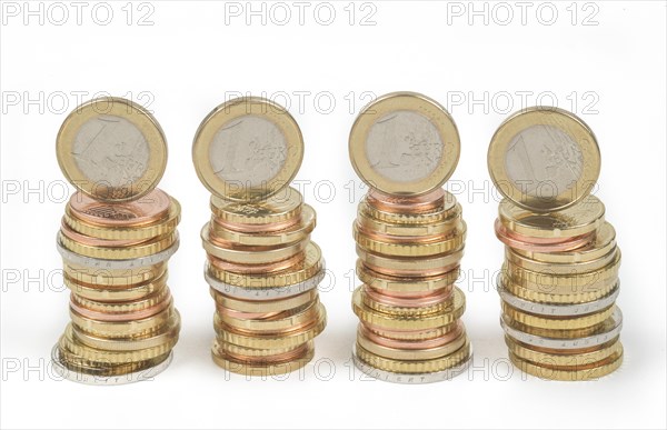 Stack of cent coins and euro coins