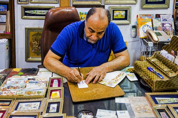 Miniature Painter on Camel Bone