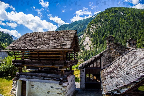 Characteristic old buildings in stone and wood in the hamlet of Mogno