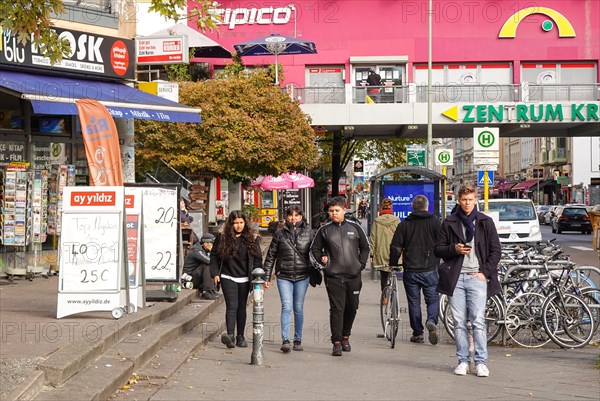 Street scene with passers-by