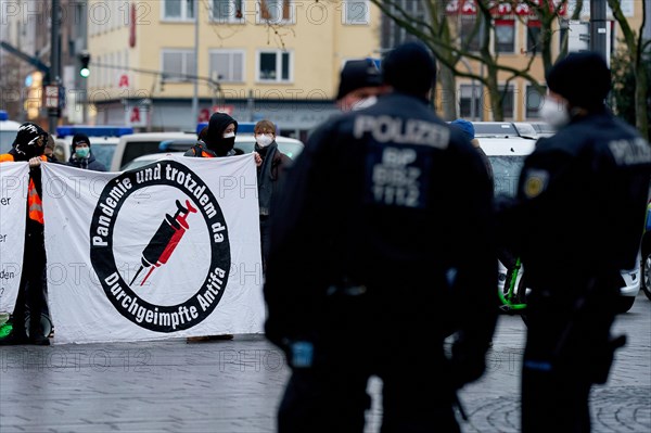 Antifa counter-demonstrators on the fringes of a demonstration by cross-thinkers against the Corona measures Koblenz