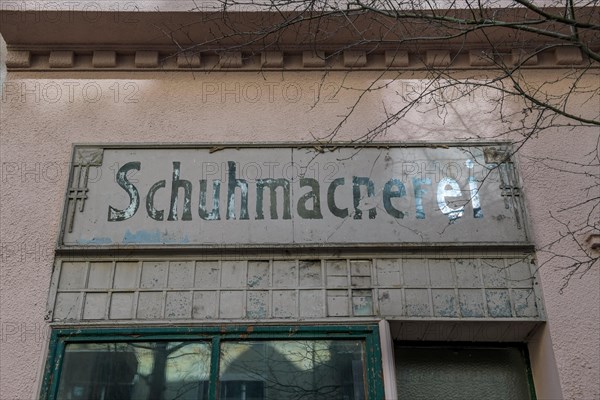 Old sign Schuhmacherei