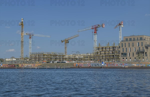 Waterkant development area with building site and construction cranes