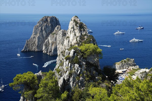 Rocky coast with boats on the sea