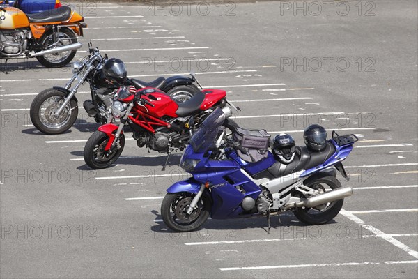 Motorbikes in a car park