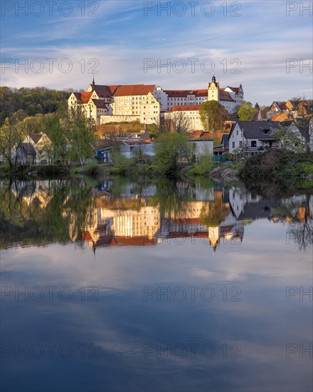 Colditz Castle reflected in the river Zwickauer Mulde