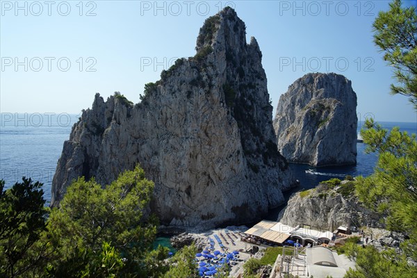 Rocky coast with boats on the sea