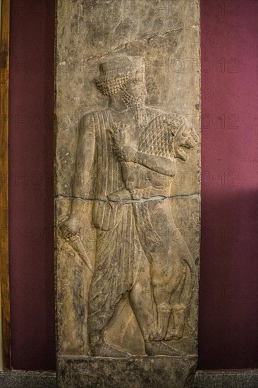 Relief of a Persian fighting a lion