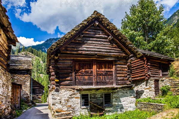 Characteristic old buildings in stone and wood in the village of Fusio