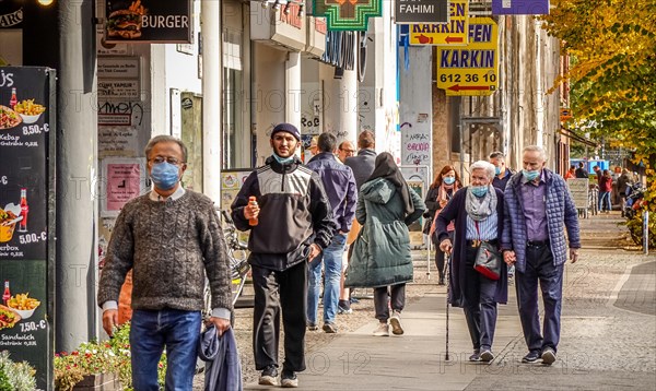 Street scene with passers-by