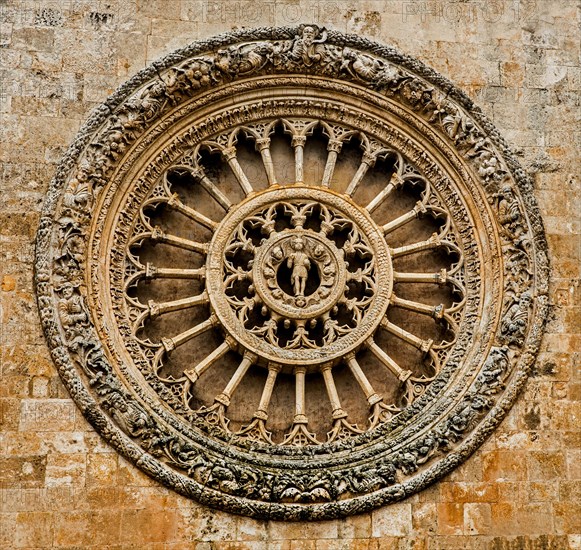 Grandiose rose window of the cathedral Santa Maria Assunta from the 15th century Ostuni